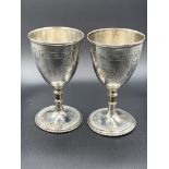 A pair of Victorian silver goblets
