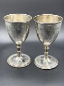 A pair of Victorian silver goblets
