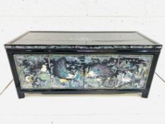 Asian cabinet decorated with mother of pearl