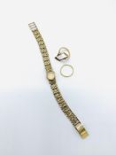9ct gold watch and strap together with a 22ct gold band and a yellow metal ring
