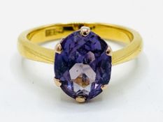 22ct gold ring set with an hexagonal faceted colour changing sapphire
