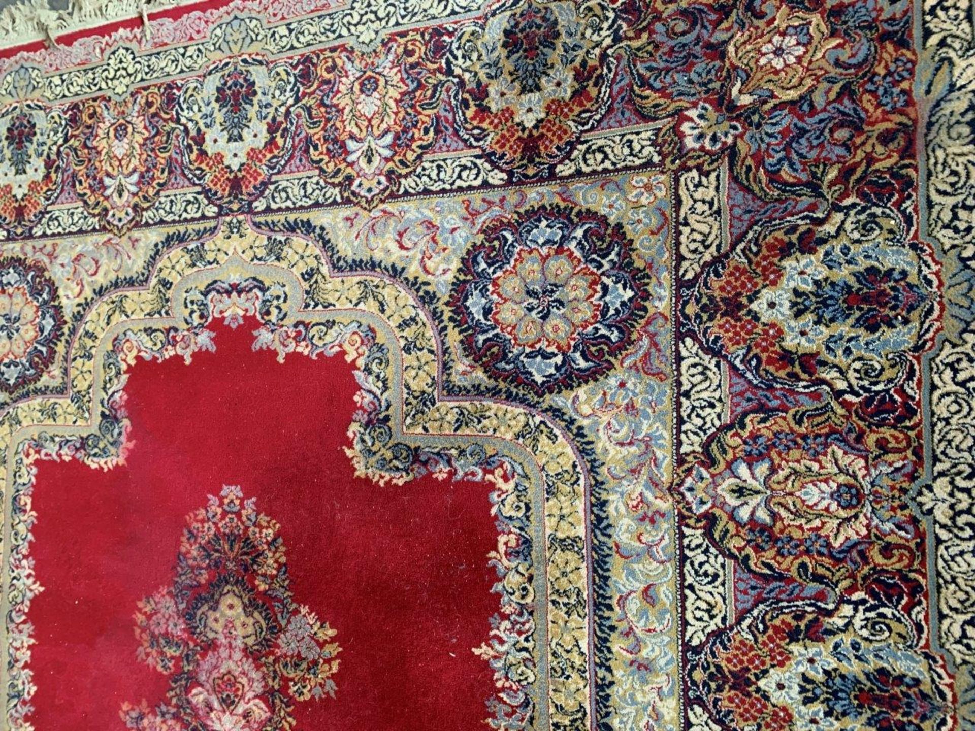 Dark red ground patterned carpet - Image 3 of 4