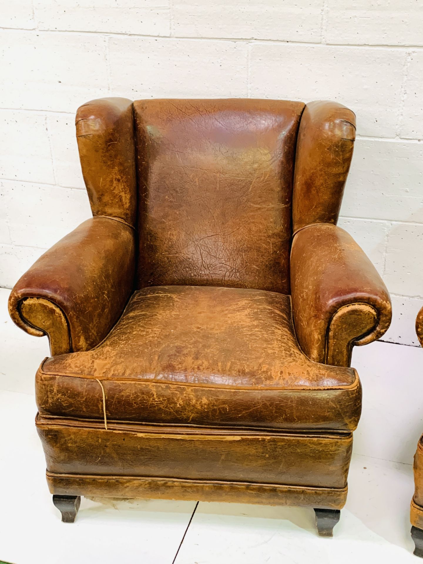 A pair of French brown leather wing back armchairs - Image 5 of 5