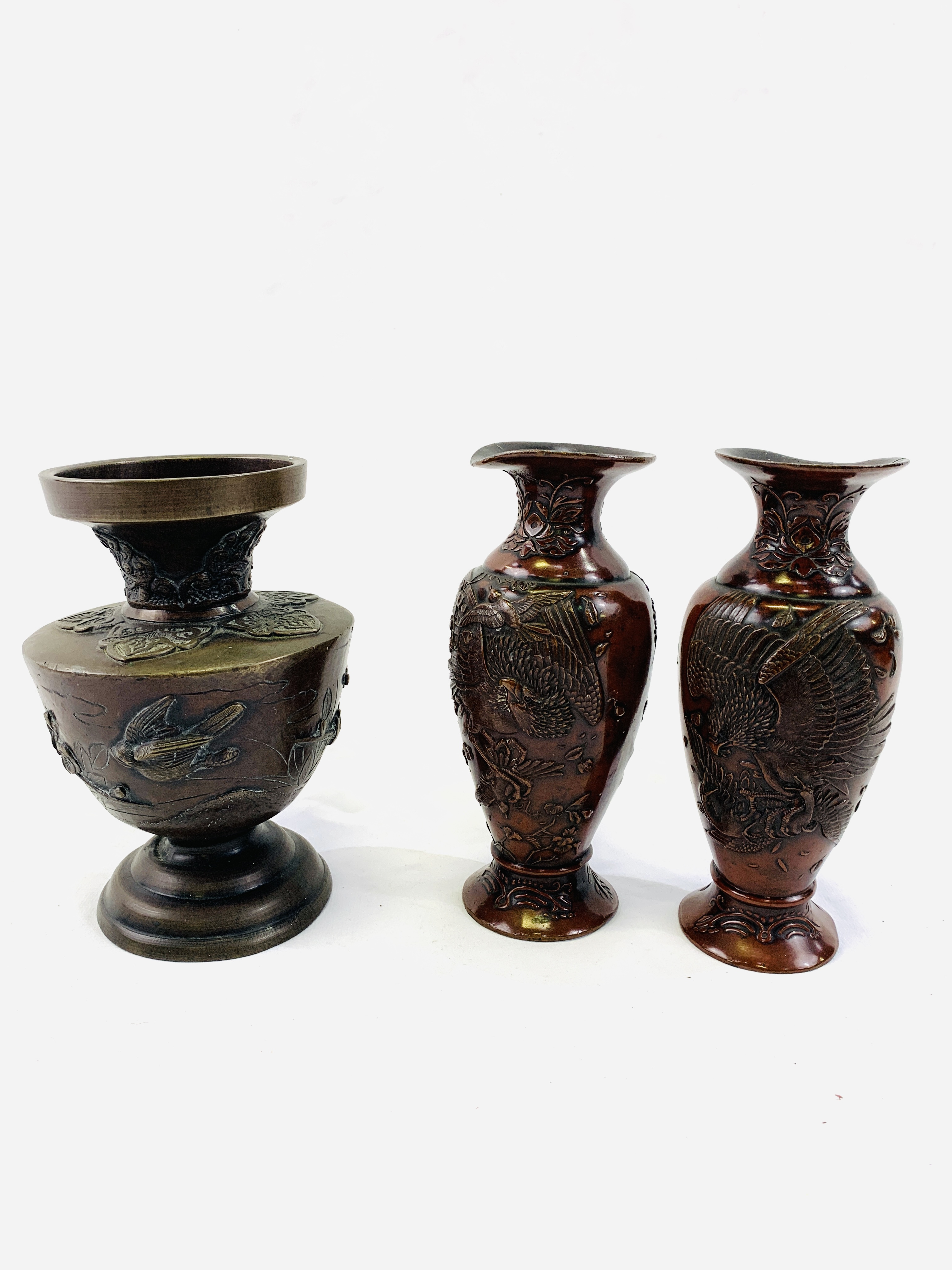 A Meiji period vase together with two other metal vases