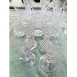 A collection of cut glass drinking glasses