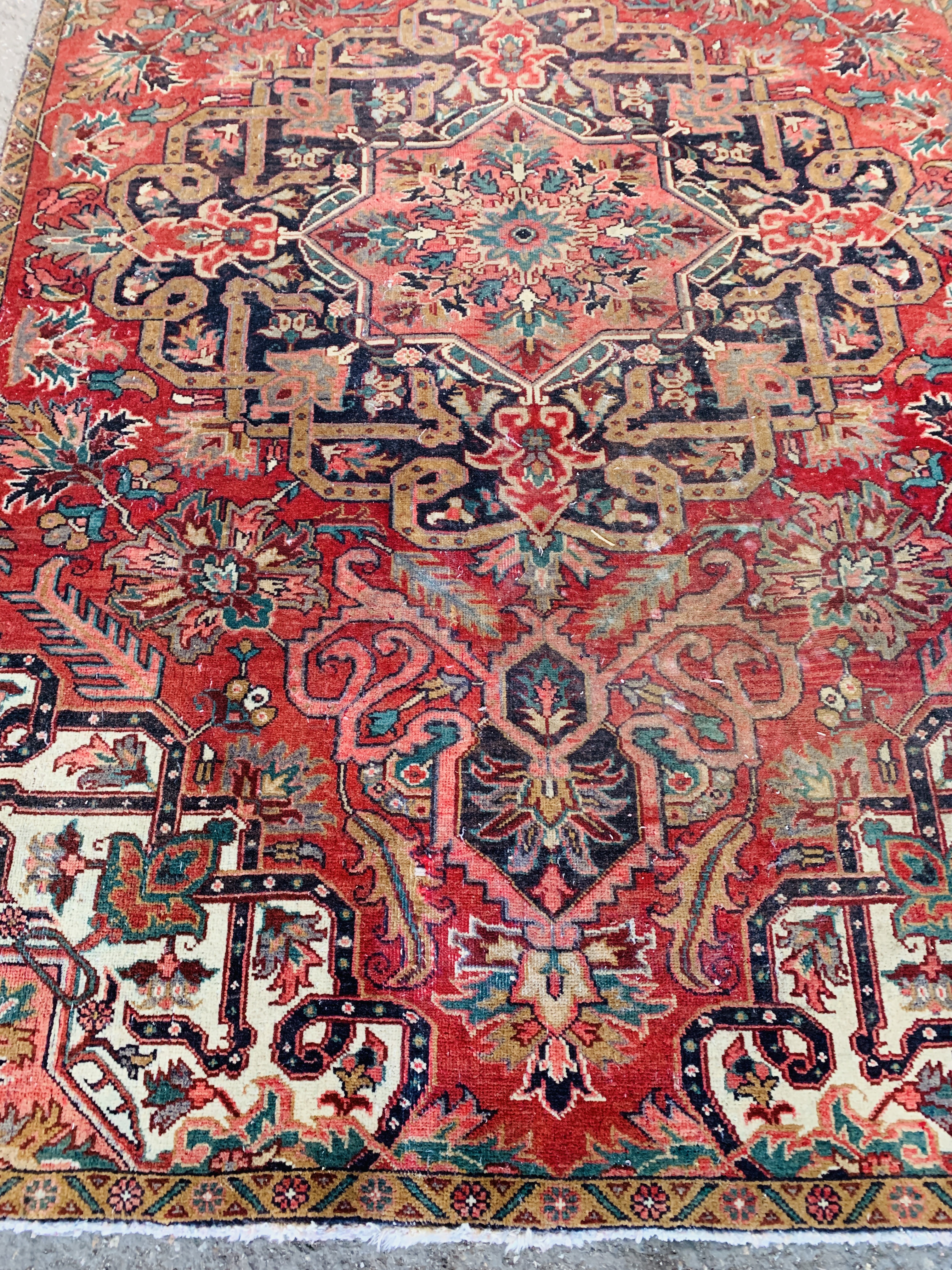 Red and beige ground Iranian wool rug