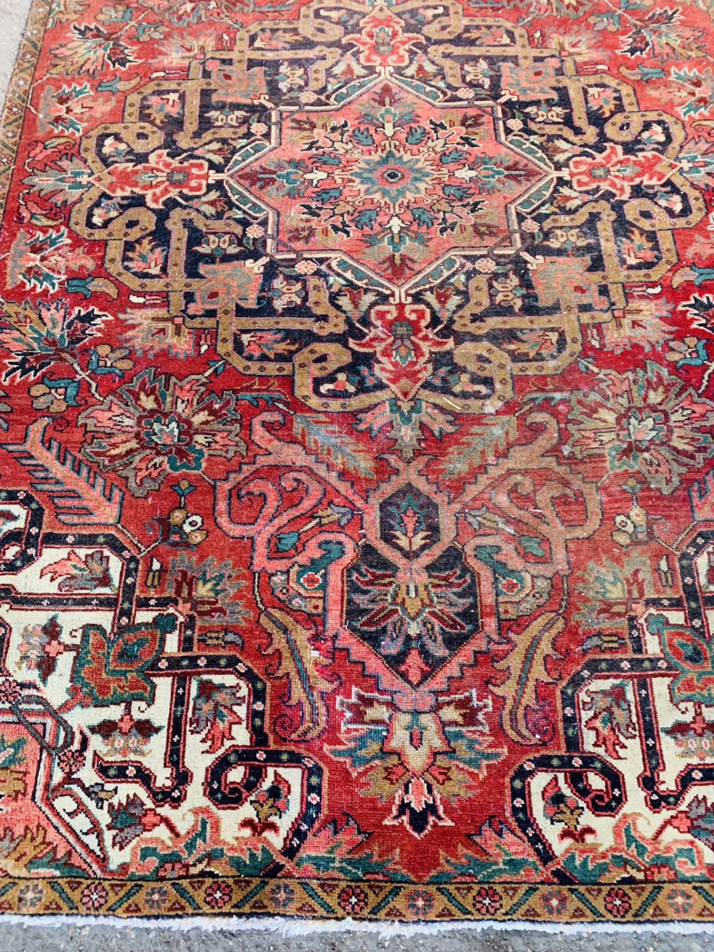 Red and beige ground Iranian wool rug