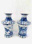 Two 19th century Oriental blue and white vases