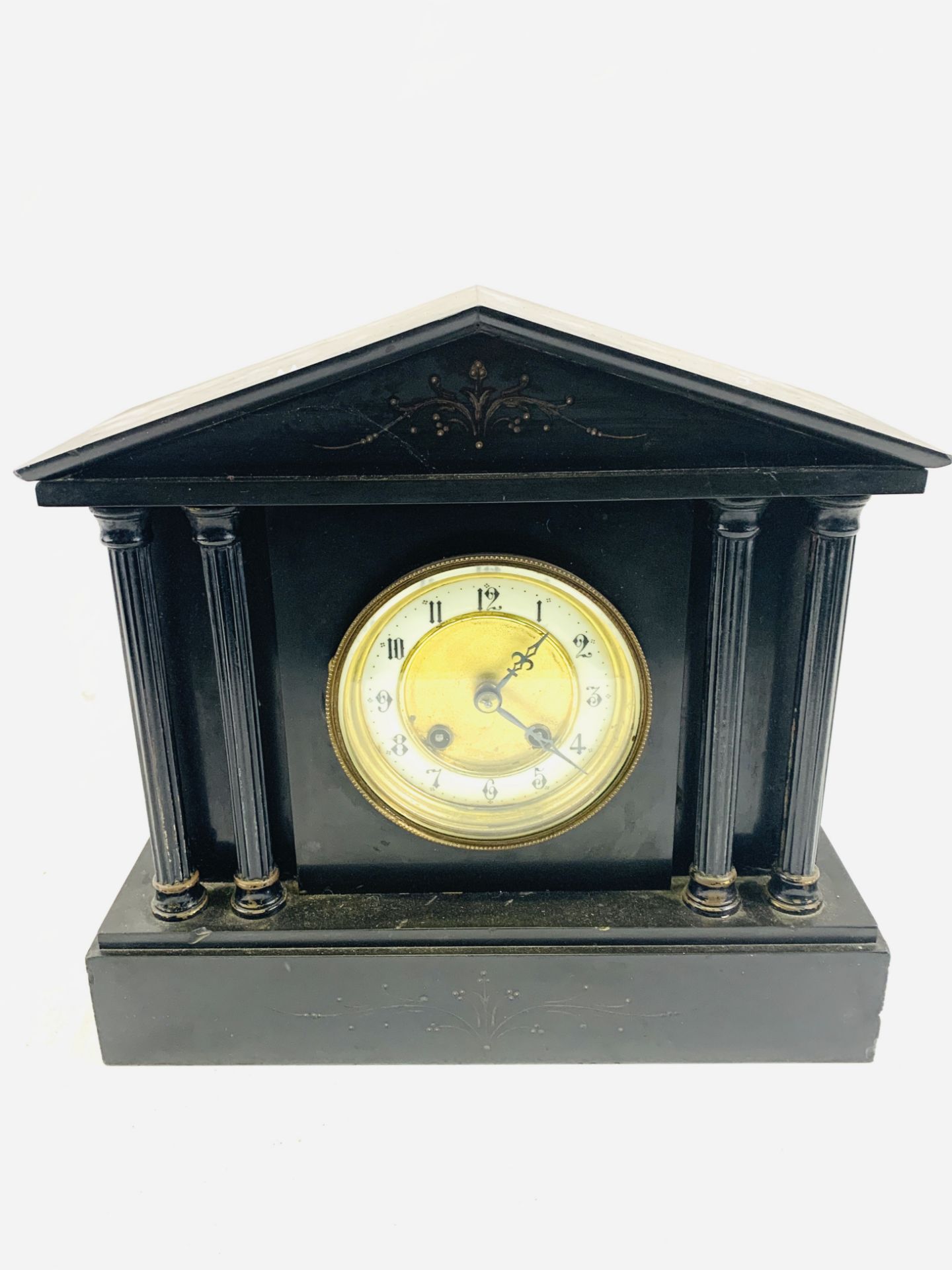 Three slate mantel clocks together with a wood cased mantel clock