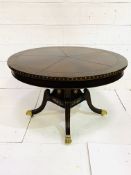 Circular table with tooled leather top