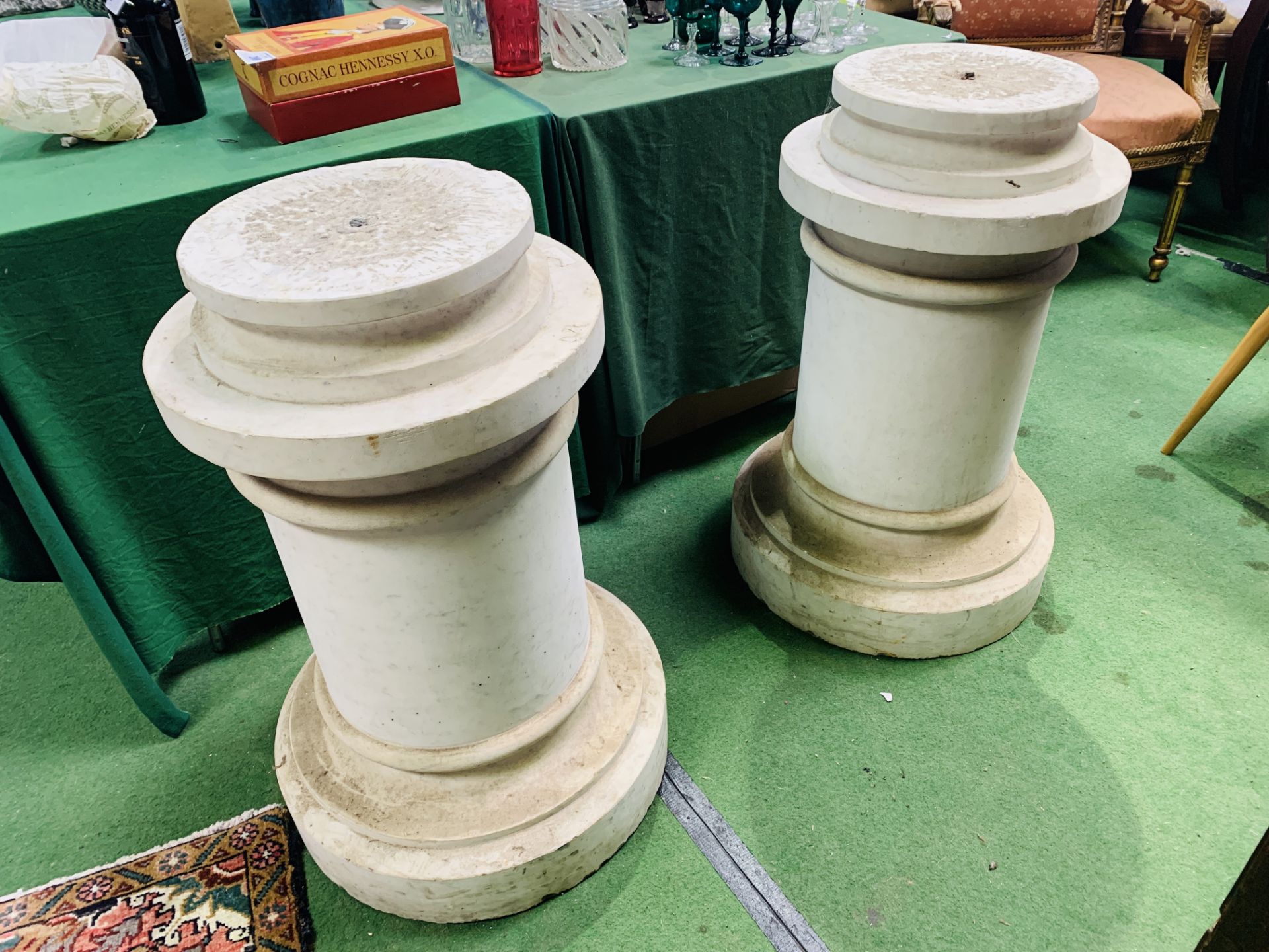 A pair of short crema marfil marble columns - Image 2 of 4