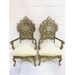 Pair of open armchairs profusely decorated with mother of pearl