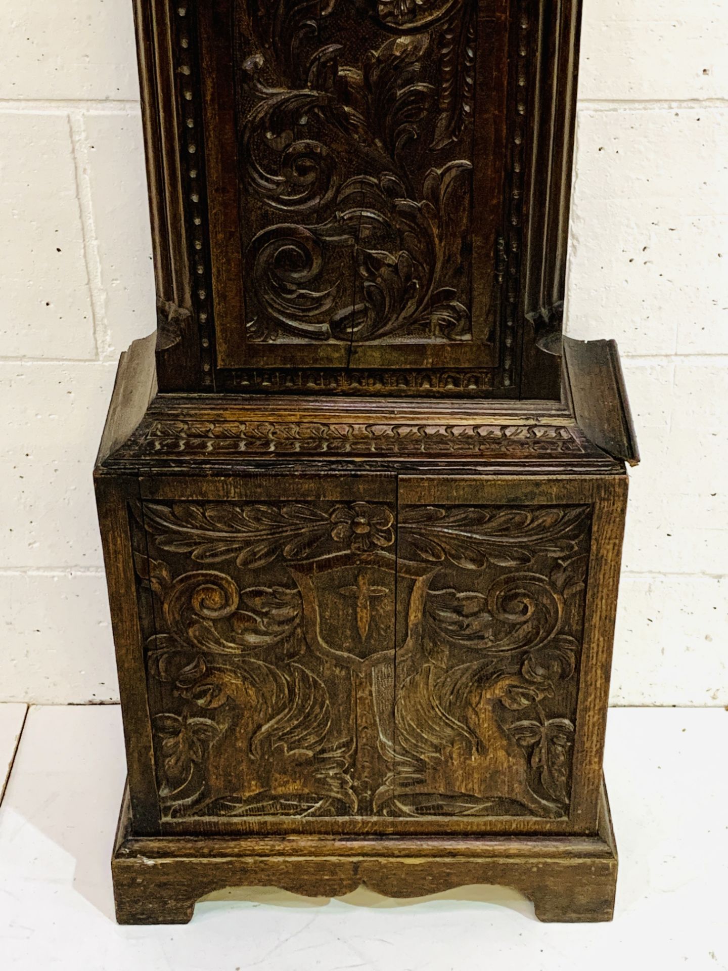 Carved oak longcase clock, the brass face written Massey, Newcastle - Image 6 of 7