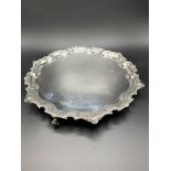 A silver scallop edge three footed tray by Francis Howard Ltd
