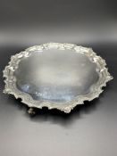 A silver scallop edge three footed tray by Francis Howard Ltd