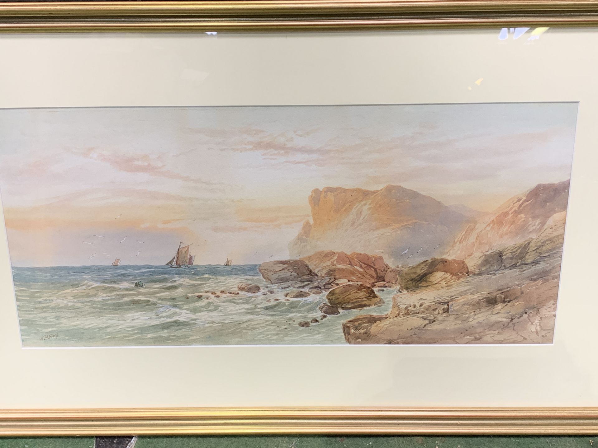 Framed and glazed watercolour of cliffs and sailing ships, signed W H Earp - Image 2 of 3