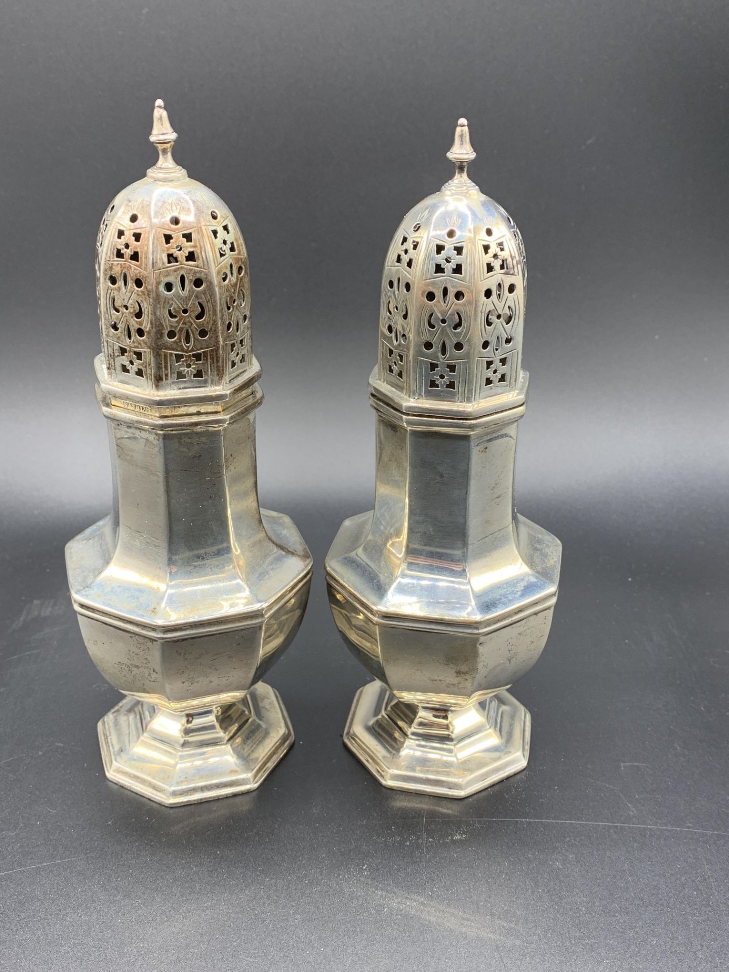 A pair of hallmarked silver sugar casters - Image 2 of 3