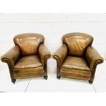 Pair of brown leather club chairs