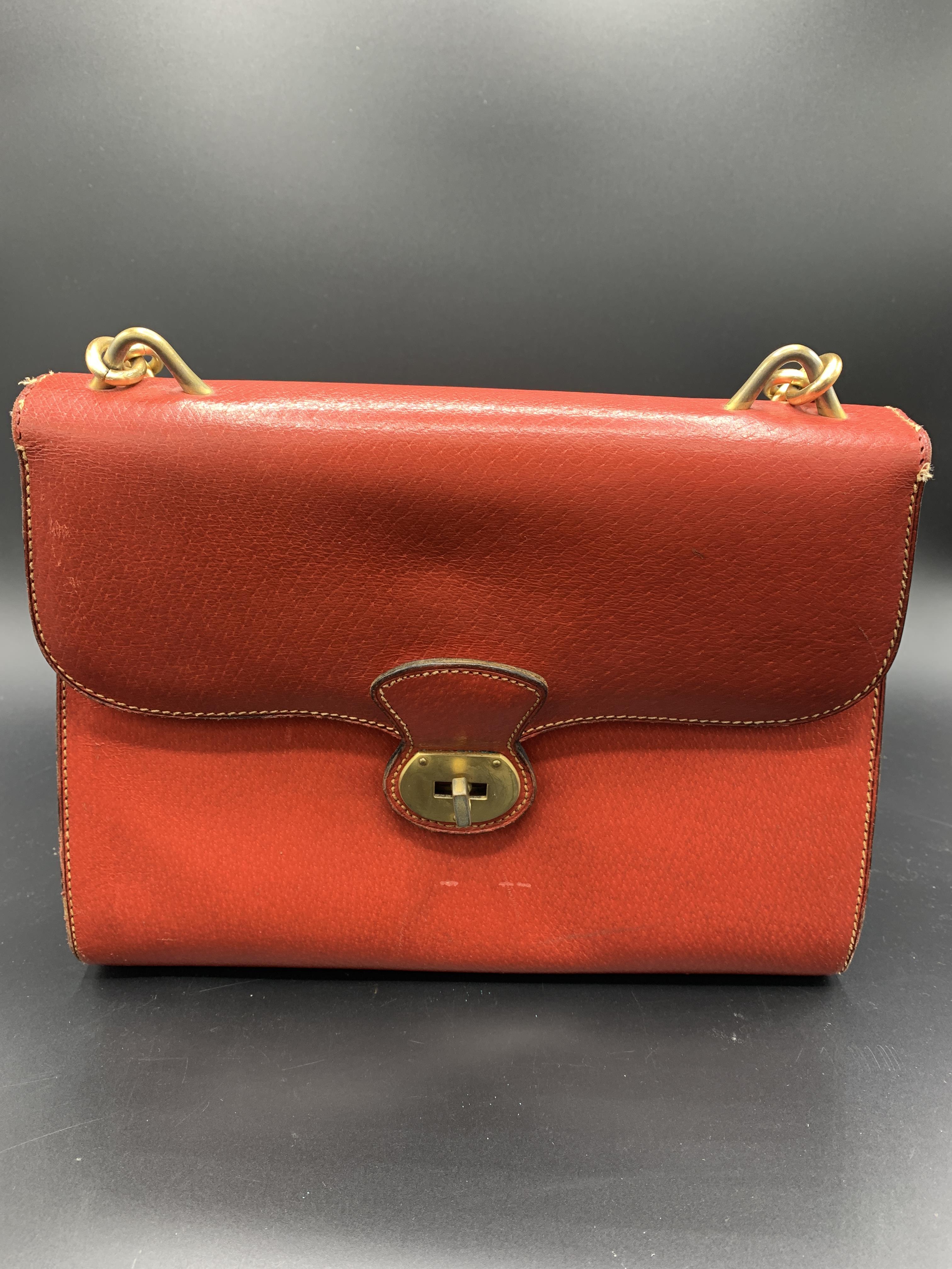 Red leather Gucci handbag