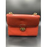 Red leather Gucci handbag