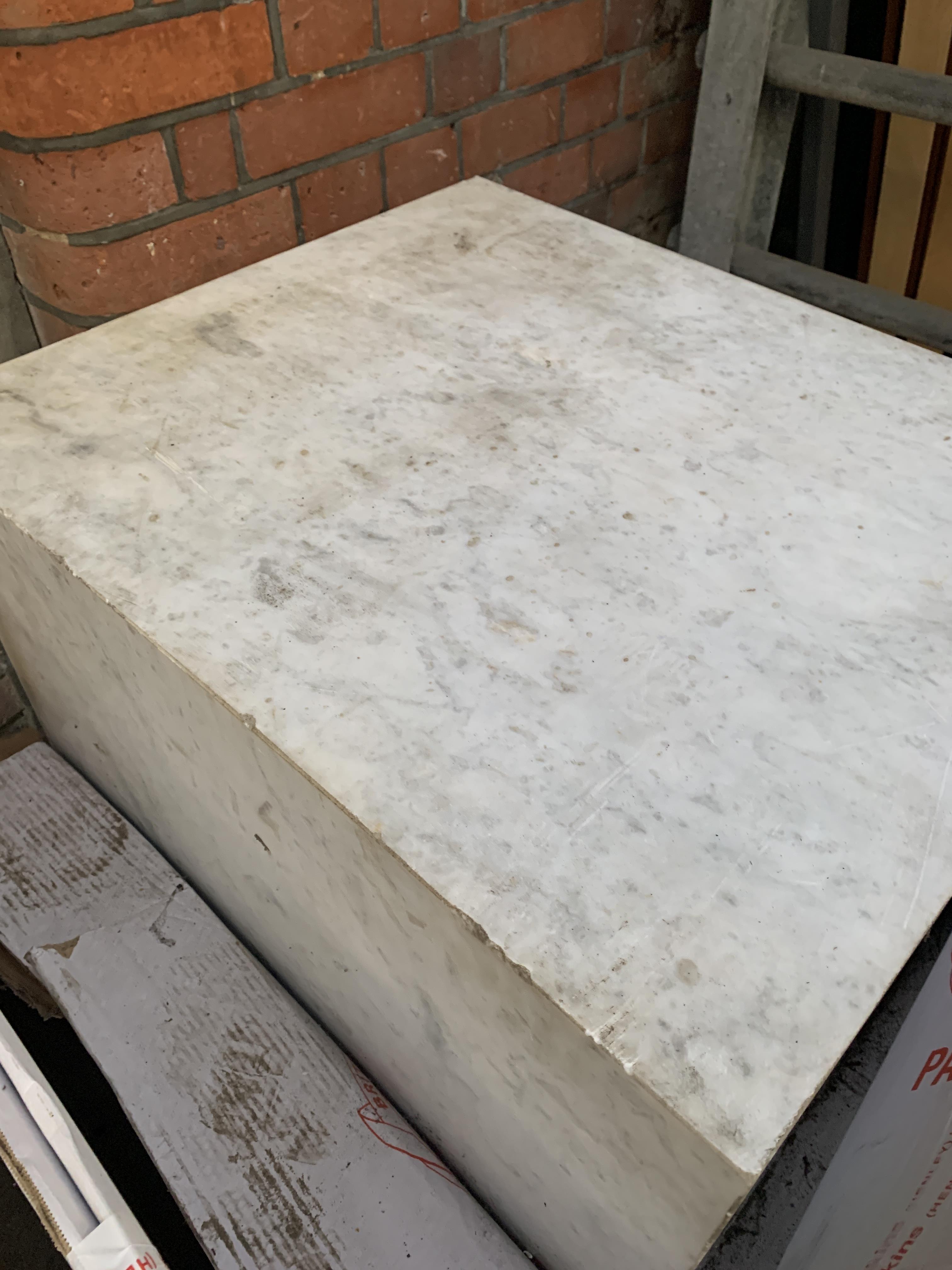 A rectangular block of calacatta marble