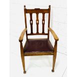 Arts and Crafts oak framed rail back open armchair