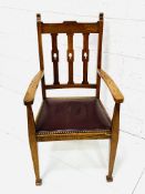 Arts and Crafts oak framed rail back open armchair