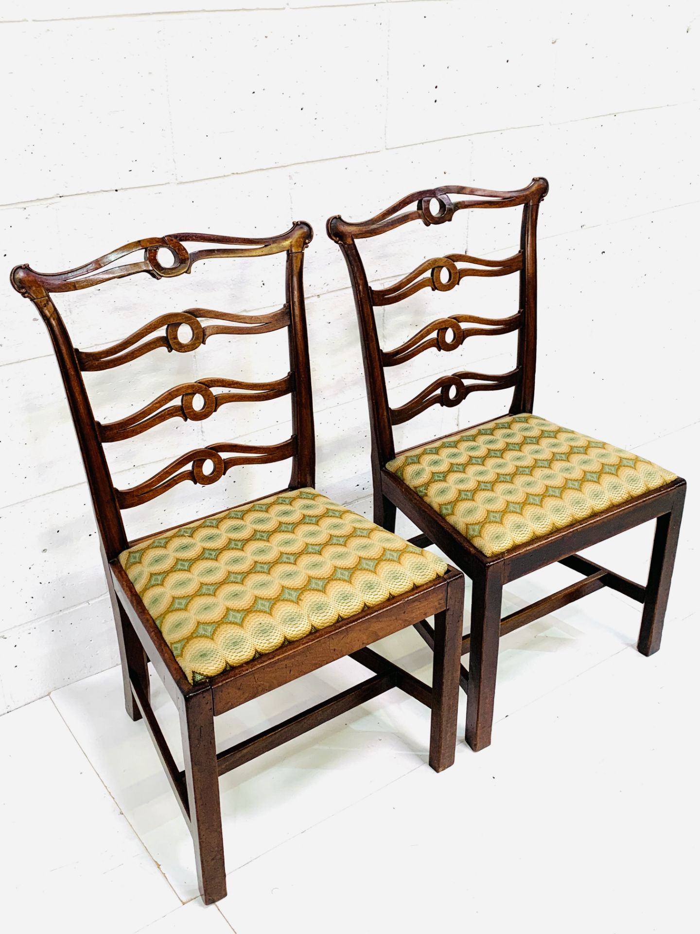 Pair of Georgian mahogany ladder back dining chairs