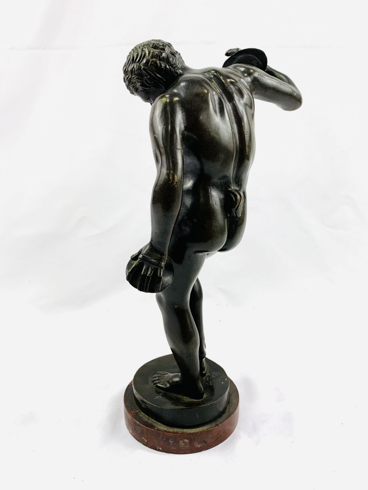 Bronze figure of a dancing faun