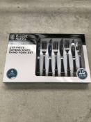 Twelve piece Russell Hobbs steak knife and fork set