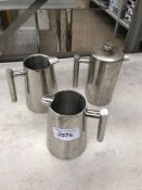 Three stainless steel jugs