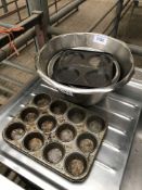 Four mixing bowls and two cake tins