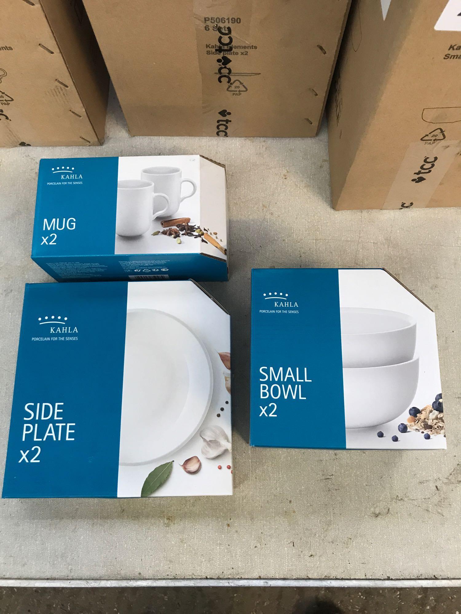 12 mugs, 12 side plates, 12 small bowls