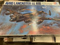 Four model kits: Tamiya, Bandai, Revell and Airfix