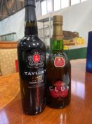 A bottle of Taylor's port and a bottle of Harvey's Club Classic