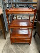 Mahogany open display stand; together with a mahogany lamp table