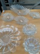 Nine Dartington 'Daisy' and 'Starburst' design crystal glass bowls