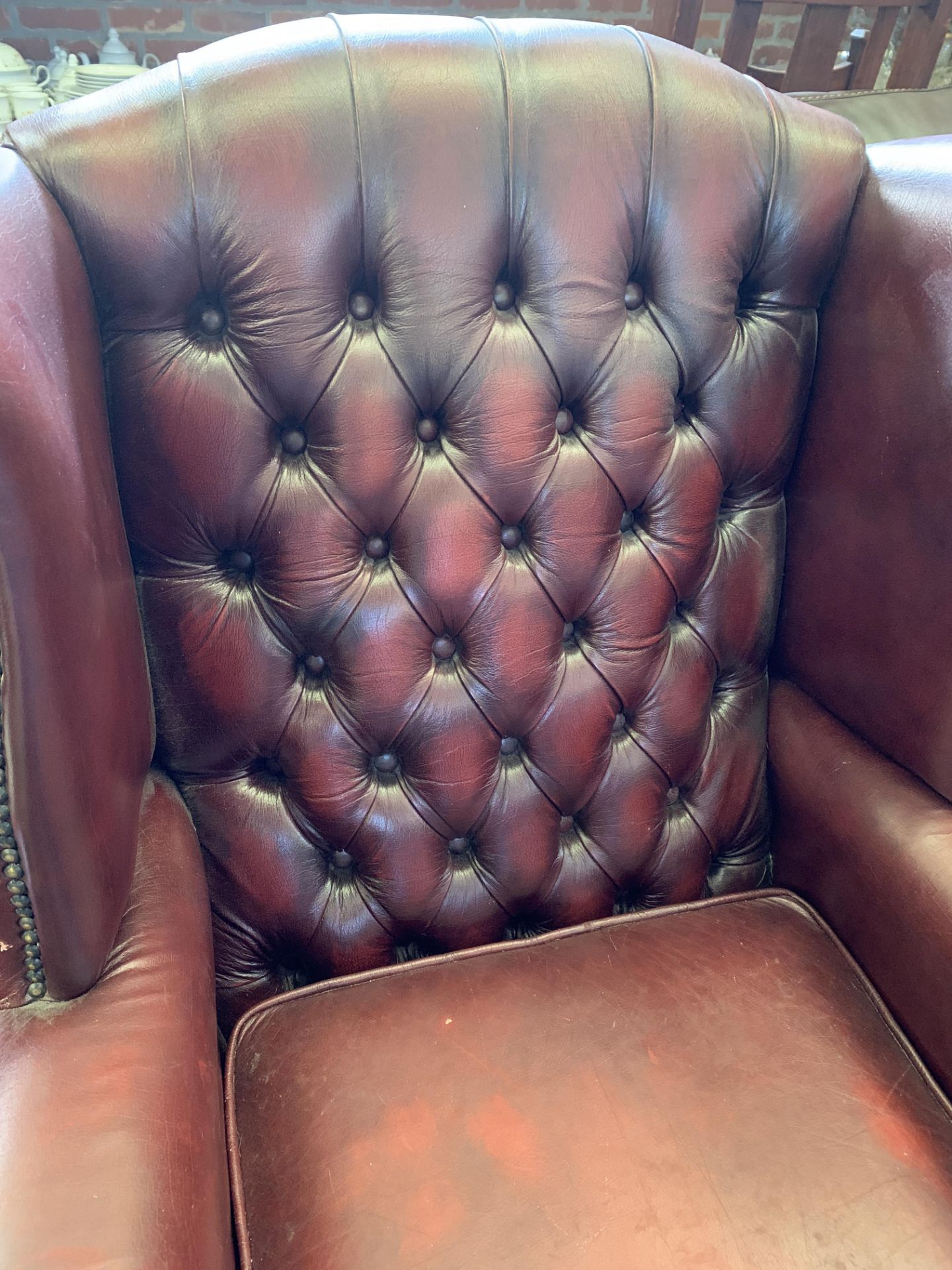 Red button leather-effect wing back armchair - Image 4 of 5