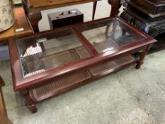 Mahogany framed bevelled edge glass top coffee table