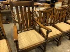 Two oak framed rail back carver chairs and 4 oak framed rail back dining chairs