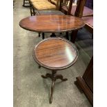 Oval teak pedestal occasional table and a mahogany wine table