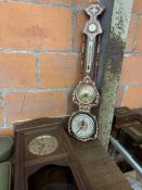 Oak case pendulum wall clock and a wall-mounted barometer/thermometer/clock