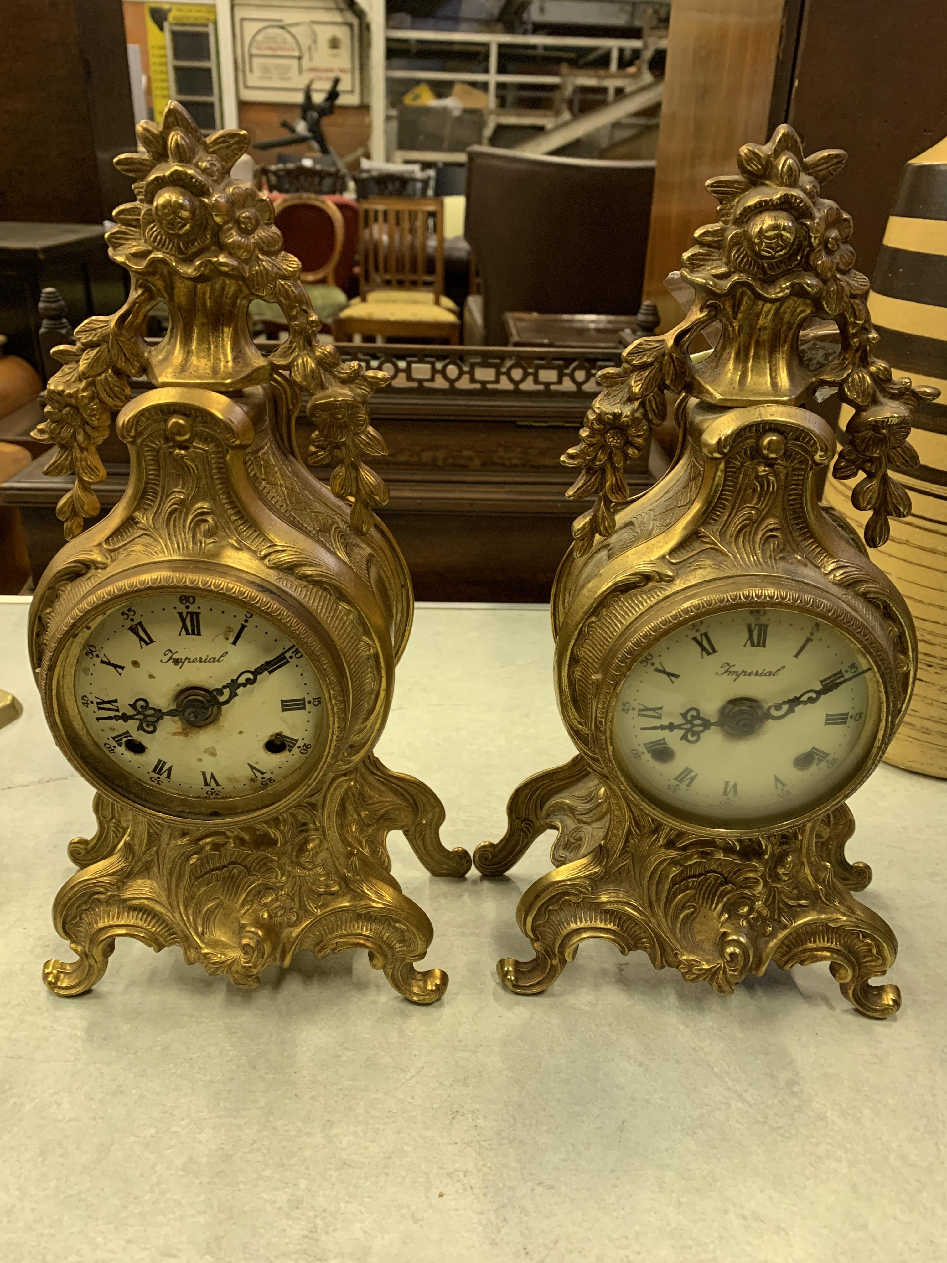 Two gilt brass mantel clocks