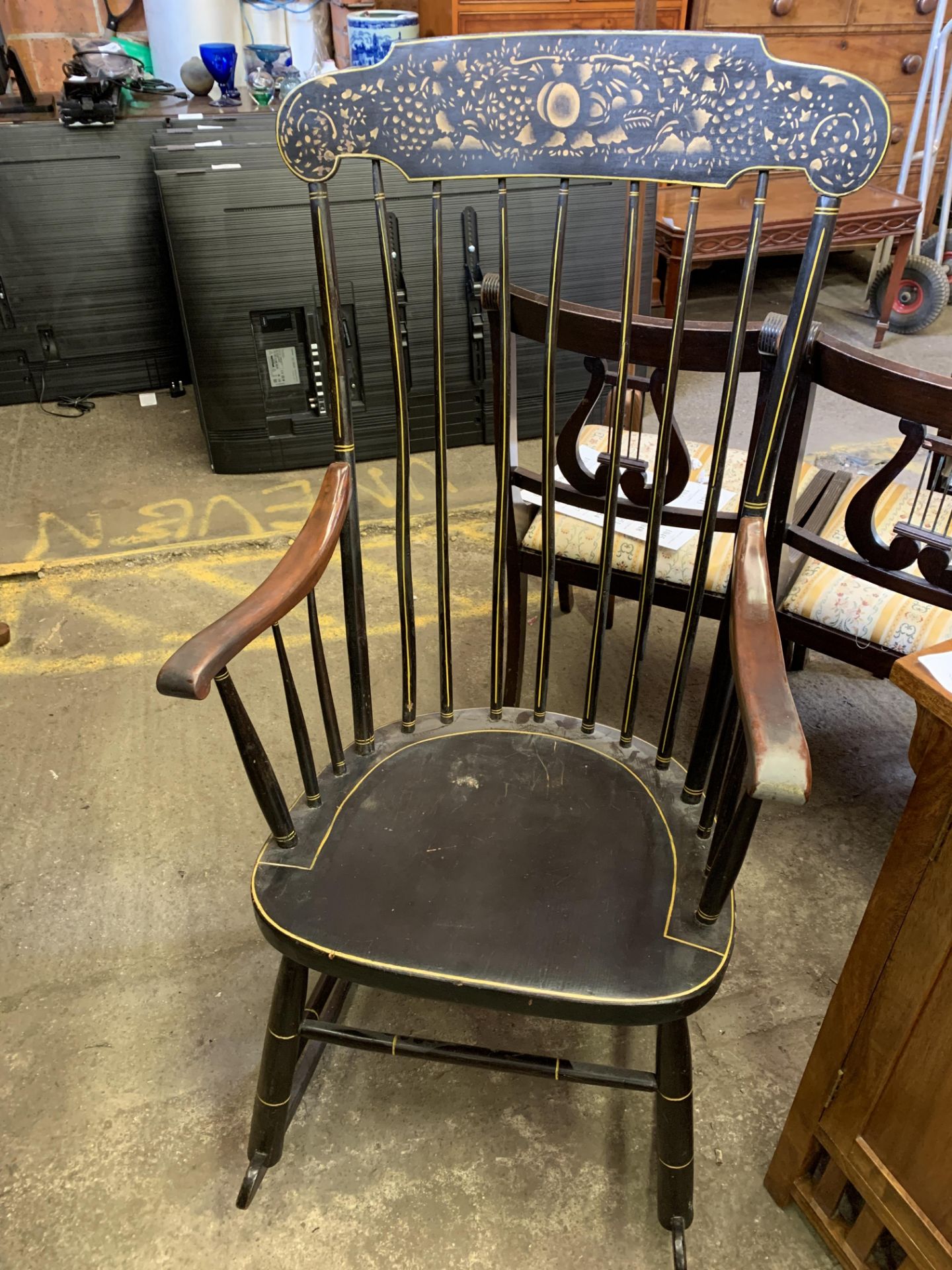 Rocking chair with spindle back and sides