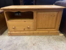 A pine bedside cabinet and a pine low sideboard