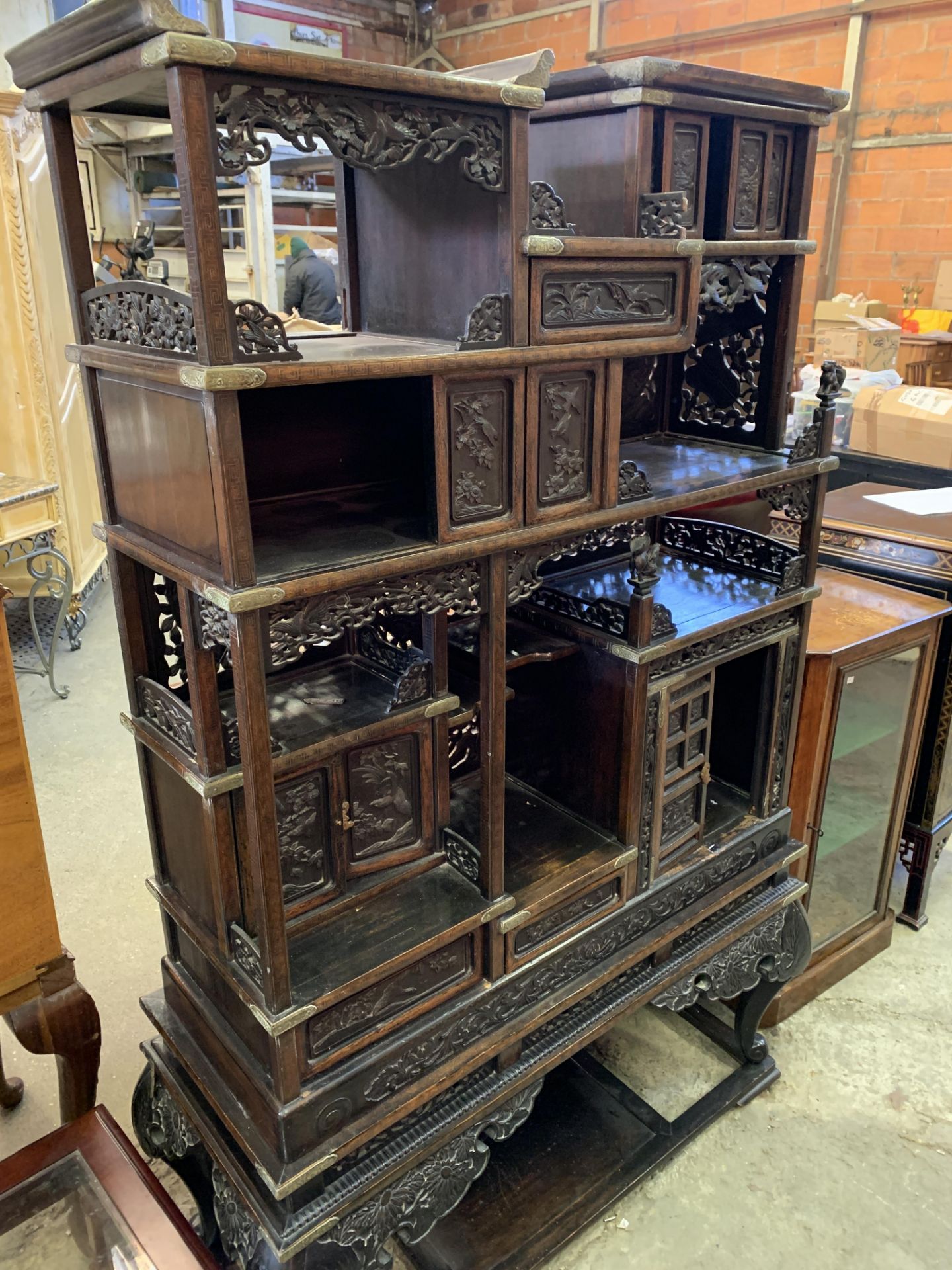 Carved wood Oriental brass bound display cabinet