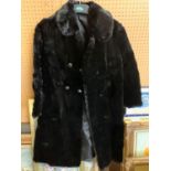 Black sheared mink three quarter length coat