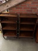 A pair of oak open waterfall bookcases