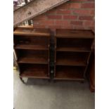 A pair of oak open waterfall bookcases