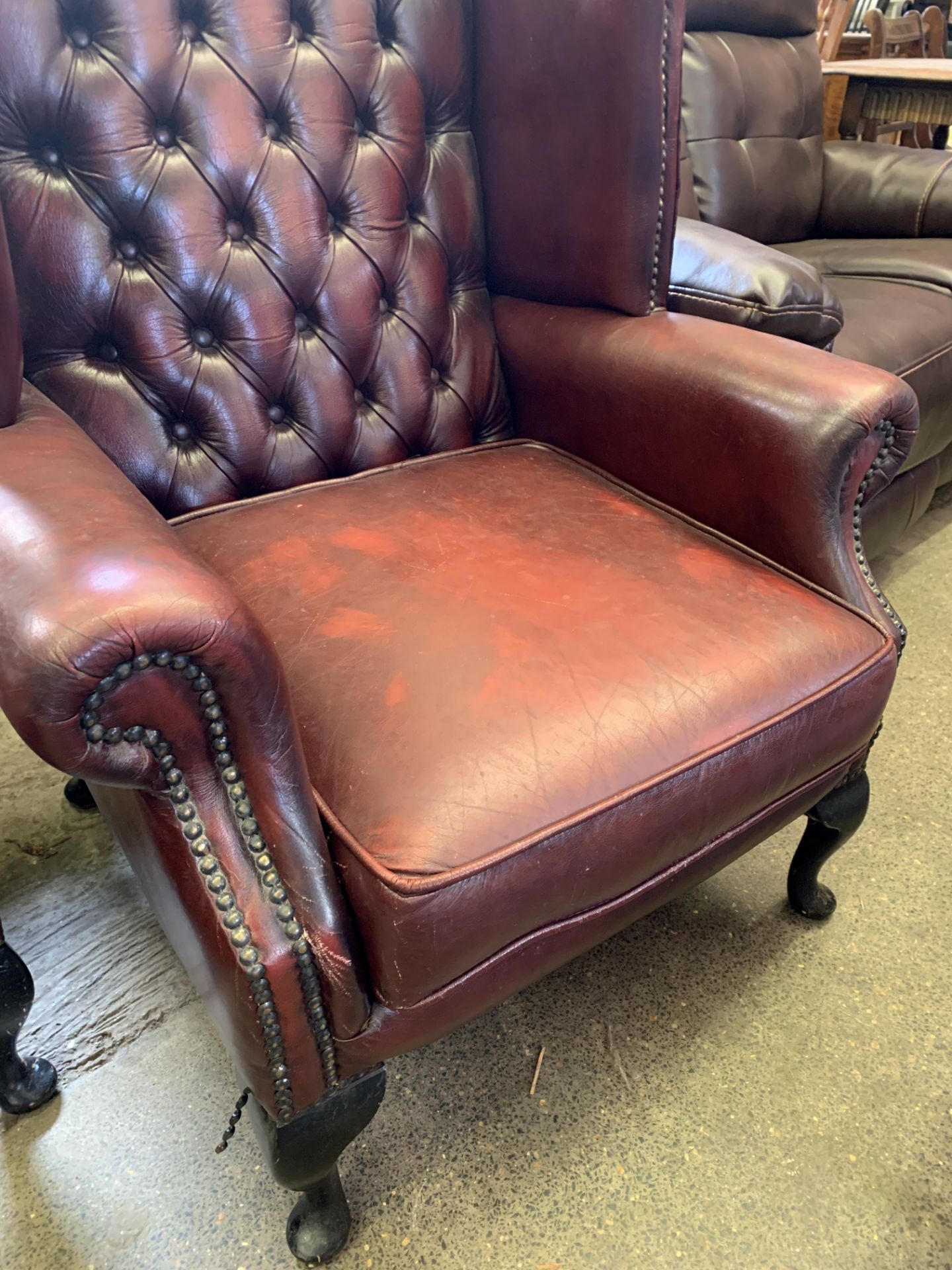 Red button leather-effect wing back armchair - Image 5 of 5